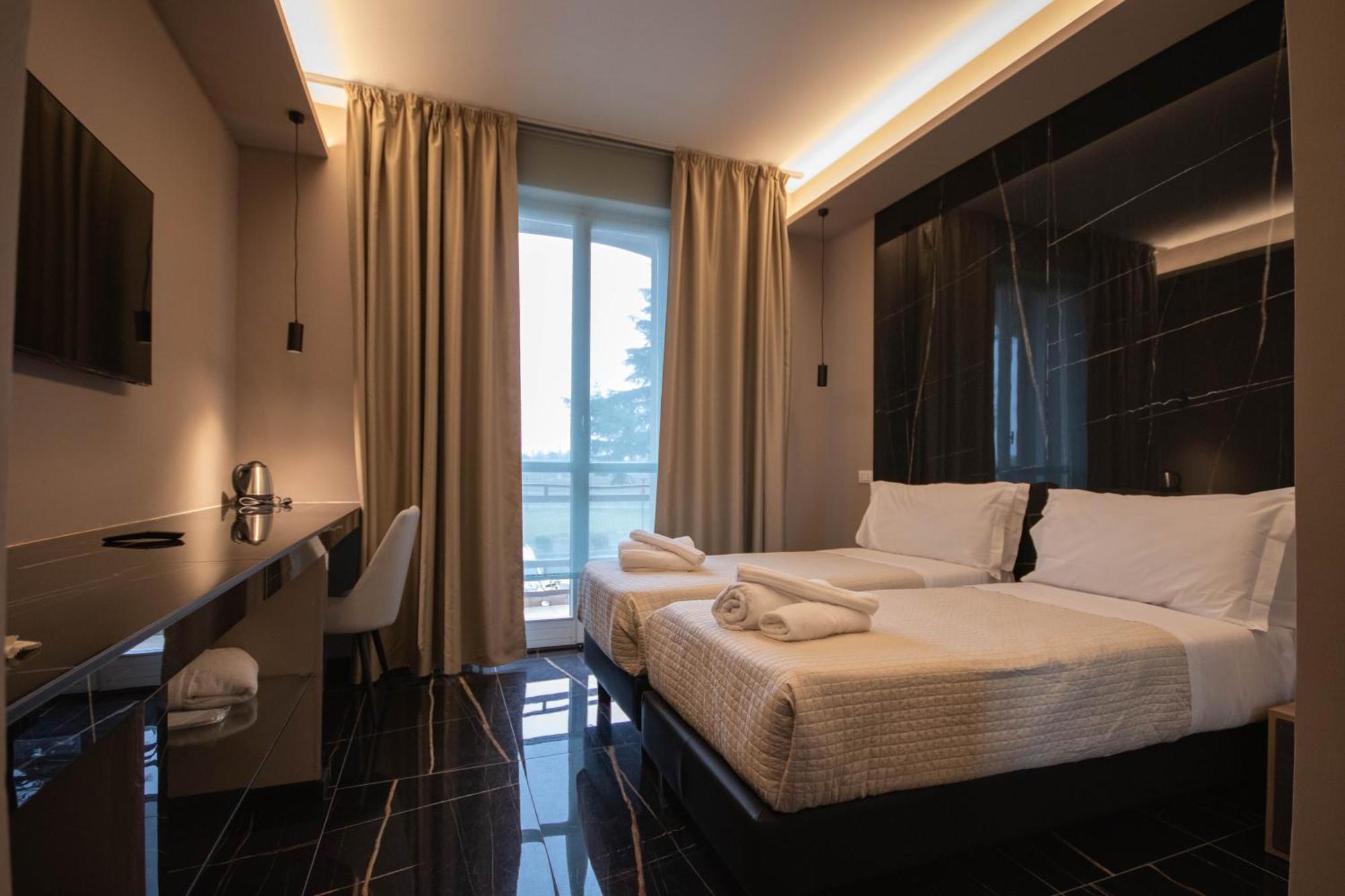 Emma Hotel Bologna Fiera غرانارولو ديلّيميليا المظهر الخارجي الصورة